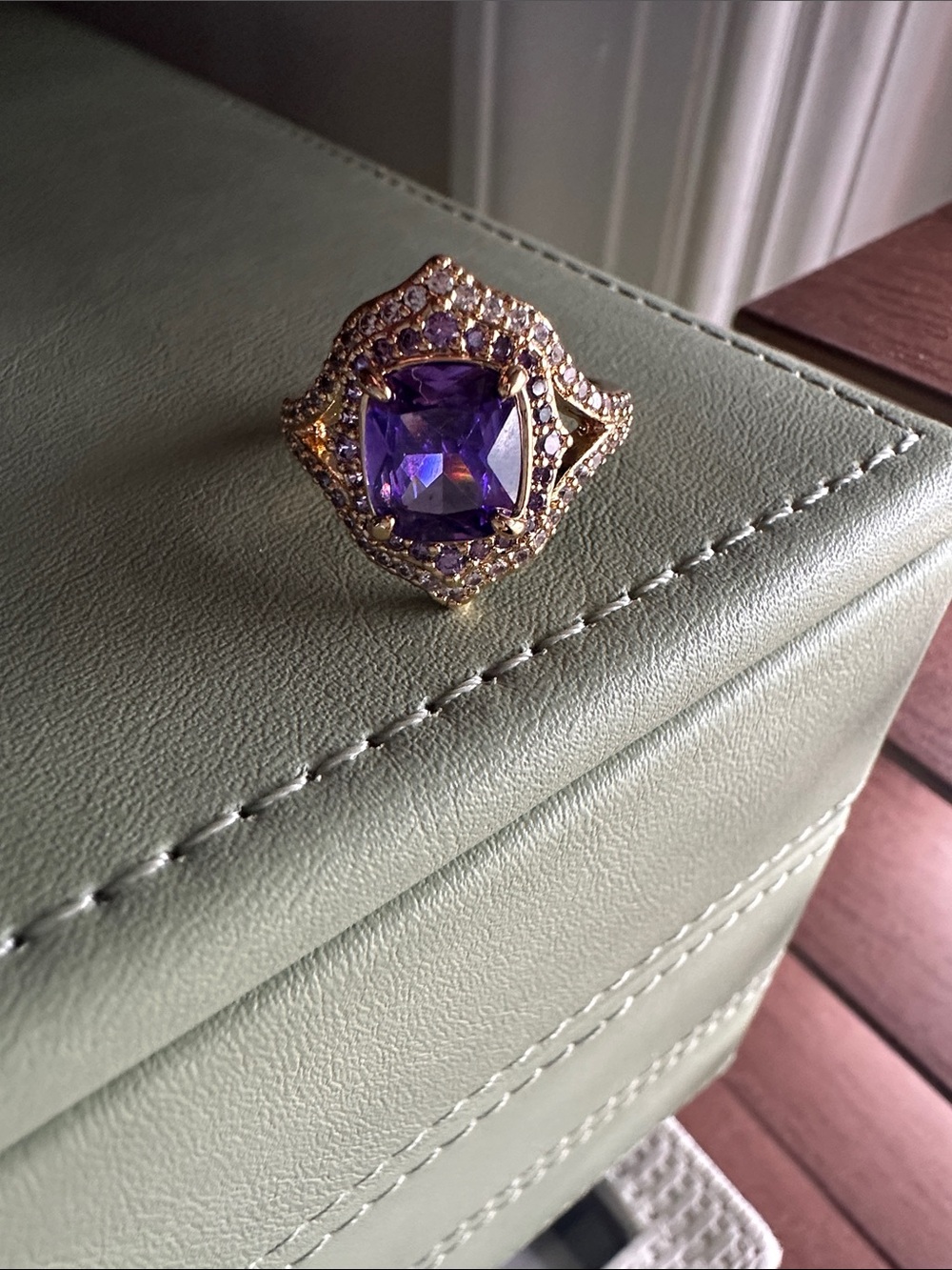 Gold-Tone Ring with Purple Center Stone - Elegant Women's Jewelry
